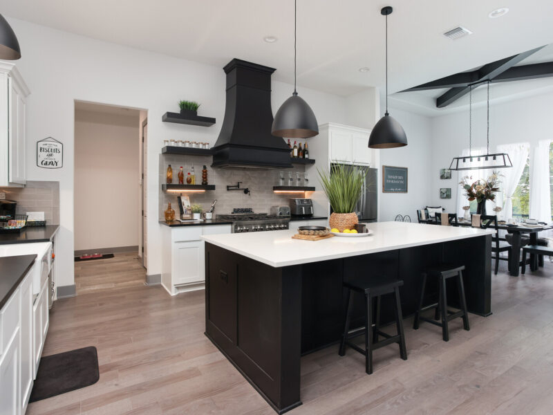 Kitchen island and dining area in The Ridge