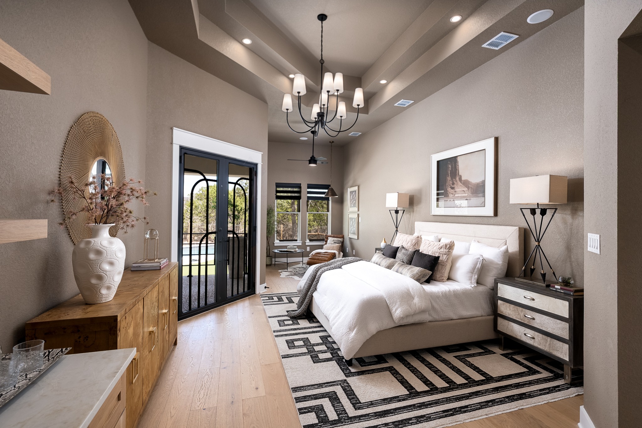 Primary bedroom with doors to the outdoor living area